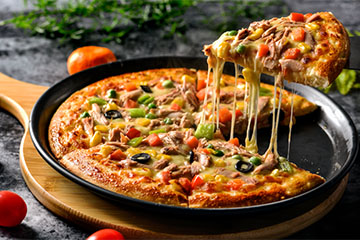 卖比萨年入16亿，达美乐“送自己”上市